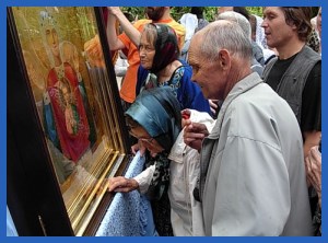 Прикладывание к иконе