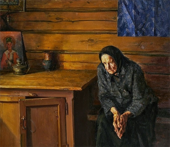 Бабушка сидит за столом